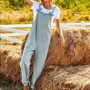 Mint green bow front overall jumpsuit with  pocket